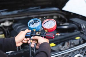 Experienced mobile car air conditioning technician servicing a vehicle in Ormiston